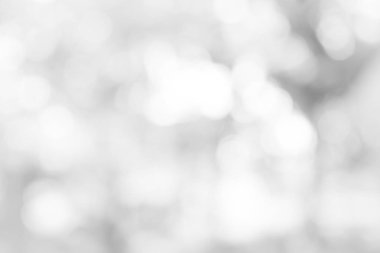 Beyaz bulanık arkaplan. Bokeh Noel 'i güzel, parlak Noel ışıklarını bulanıklaştırdı