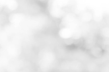 Beyaz bulanık arkaplan. Bokeh Noel 'i güzel, parlak Noel ışıklarını bulanıklaştırdı