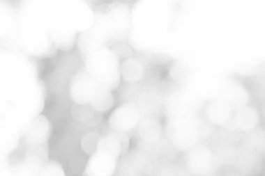 Beyaz bulanık arkaplan. Bokeh Noel 'i güzel, parlak Noel ışıklarını bulanıklaştırdı