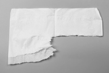 gri arka plan üzerinde beyaz yırtık dokular. koleksiyon kağıt RIP