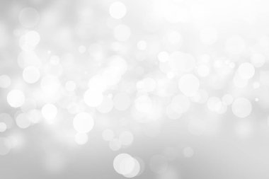 Beyaz bulanık arkaplan. Bokeh Noel 'i güzel, parlak Noel ışıklarını bulanıklaştırdı