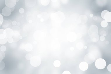 Beyaz bulanık arkaplan. Bokeh Noel 'i güzel, parlak Noel ışıklarını bulanıklaştırdı