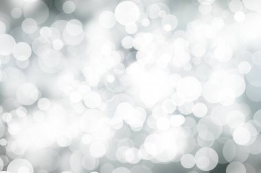 Beyaz bulanık arkaplan. Bokeh Noel 'i güzel, parlak Noel ışıklarını bulanıklaştırdı