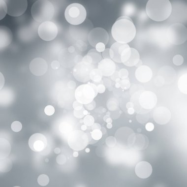 Beyaz bulanık arkaplan. Bokeh Noel 'i güzel, parlak Noel ışıklarını bulanıklaştırdı