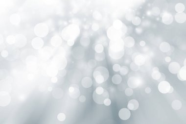 Beyaz bulanık arkaplan. Bokeh Noel 'i güzel, parlak Noel ışıklarını bulanıklaştırdı