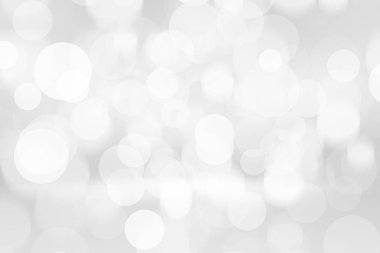 Beyaz bulanık arkaplan. Bokeh Noel 'i güzel, parlak Noel ışıklarını bulanıklaştırdı