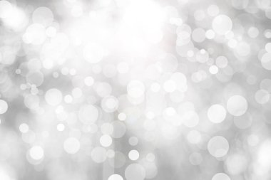 Beyaz bulanık arkaplan. Bokeh Noel 'i güzel, parlak Noel ışıklarını bulanıklaştırdı