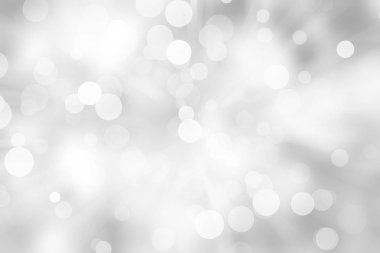 Beyaz bulanık arkaplan. Bokeh Noel 'i güzel, parlak Noel ışıklarını bulanıklaştırdı