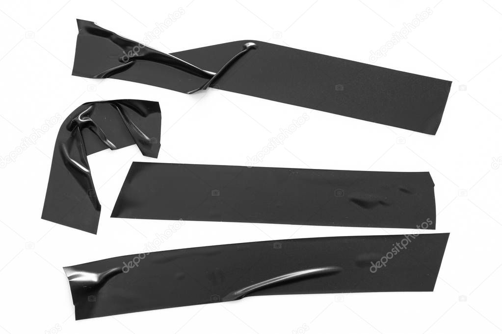 Set of black tapes on white background. Torn horizontal and different size black sticky tape, adhesive pieces.