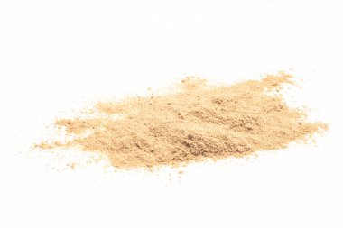 sand on white background. grain of sand