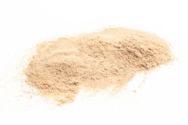sand on white background. grain of sand