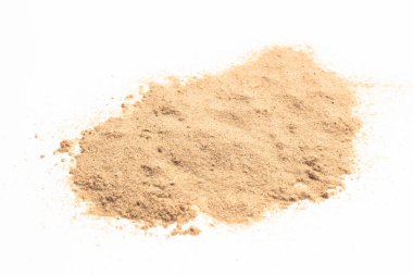 sand on white background. grain of sand