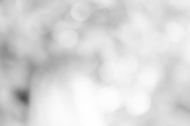 Beyaz bulanık arkaplan. Bokeh Noel 'i güzel, parlak Noel ışıklarını bulanıklaştırdı