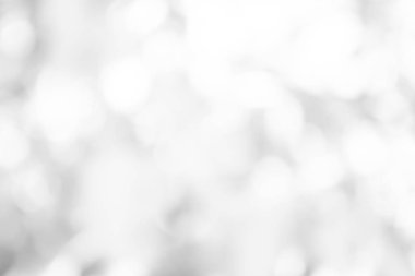 Beyaz bulanık arkaplan. Bokeh Noel 'i güzel, parlak Noel ışıklarını bulanıklaştırdı