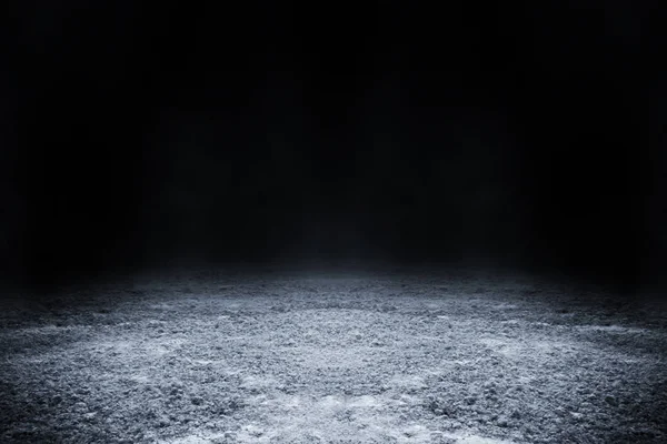 Empty surface of ground pattern with black backdrop wallpaper.