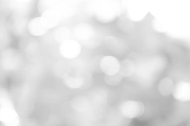 Beyaz bulanık arkaplan. Bokeh Noel 'i güzel, parlak Noel ışıklarını bulanıklaştırdı