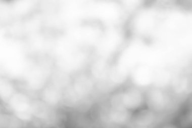 Beyaz bulanık arkaplan. Bokeh Noel 'i güzel, parlak Noel ışıklarını bulanıklaştırdı