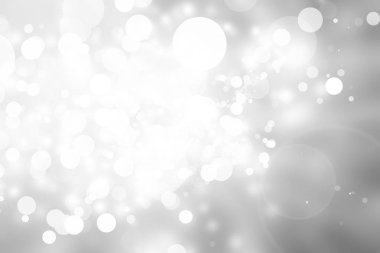 Beyaz bulanık arkaplan. Bokeh Noel 'i güzel, parlak Noel ışıklarını bulanıklaştırdı