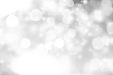 Beyaz bulanık arkaplan. Bokeh Noel 'i güzel, parlak Noel ışıklarını bulanıklaştırdı