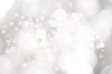 Beyaz bulanık arkaplan. Bokeh Noel 'i güzel, parlak Noel ışıklarını bulanıklaştırdı