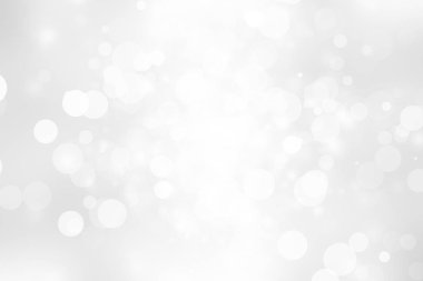 Beyaz ve gri soyut arkaplan. Bokeh Noel 'i güzel, parlak Noel ışıklarını bulanıklaştırdı