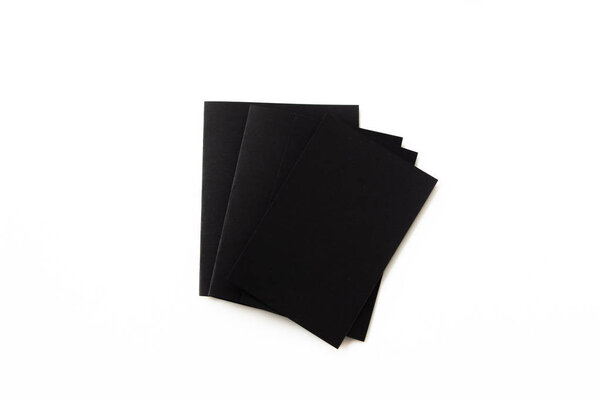 Blank portrait A4. brochure magazine isolated on white, changeable background / black paper isolated on white