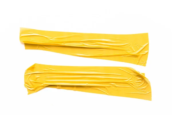 白色背景的黄色带子 扭动水平和不同尺寸的黄色粘贴带 粘贴件 — 图库照片