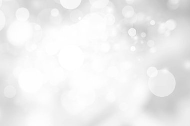 Beyaz bulanık arkaplan. Bokeh Noel 'i güzel, parlak Noel ışıklarını bulanıklaştırdı