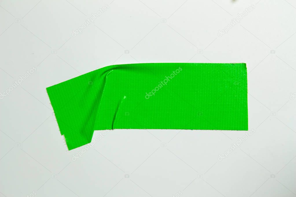 Set of green tapes on white background. Torn horizontal and different size green sticky tape, adhesive pieces.