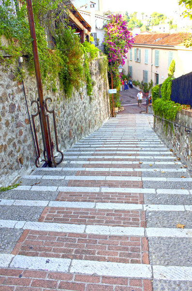 Cannes, France - August 6, 2013: picturesque narrow streets in the old town