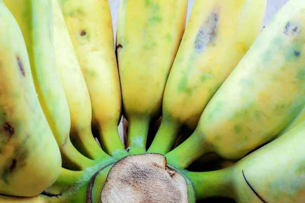 Banana of ripe on a wooden with texture background.