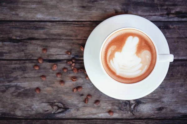 Cangkir Kopi Atas Meja Kayu Dengan Latar Belakang Tampilan Atas — Stok Foto