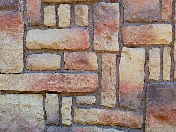 Stor brun sten i väggen bakgrund — Stockfoto