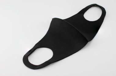 Beyaz arka planda bez yüz maskesi.