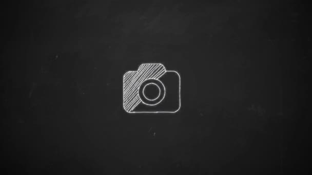 Hand drawing line art showingcamera symbol with white chalk on blackboard — Stock Video