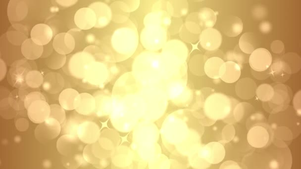 Gouden bokeh lichten deeltjes en starglow — Stockvideo