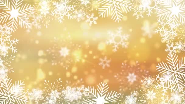 Schöne Schneeflocken rotieren auf einem goldenen Hintergrund Linse flackern Bokeh — Stockvideo