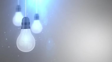 dize beyaz arka plan üzerinde asılı aşağı düşen parlayan Ampul ampul