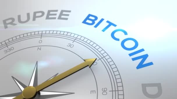 Kompass mit dem Text-Bitcoin-Konzeptvideo für Kryptowährung blauer glänzender Hintergrund — Stockvideo