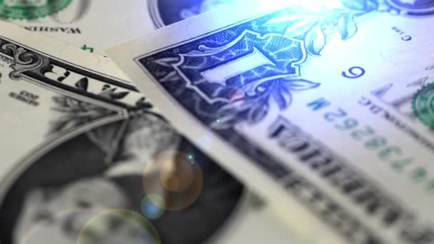 Dolarowych, tło pieniądze. Pieniądze dolarów leżące na drewnianym stole zbliżenie portret George'a Washingtona na rachunki — Wideo stockowe