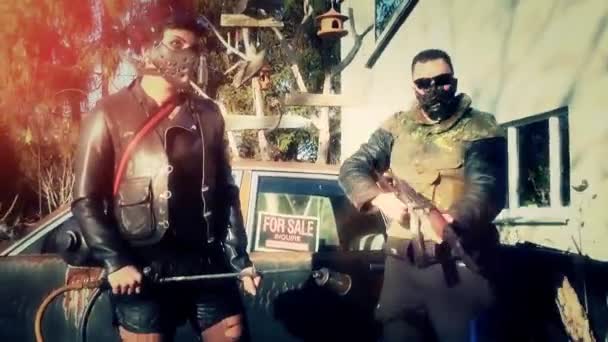 Gothic warriors posing with guns and shooting towards camera — Stock Video