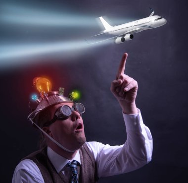 Alüminyum folyo kafa chemtrails ile gökyüzü ve ponting bir uçak için seyir ile takım elbise perişan görünümlü komplo inanan