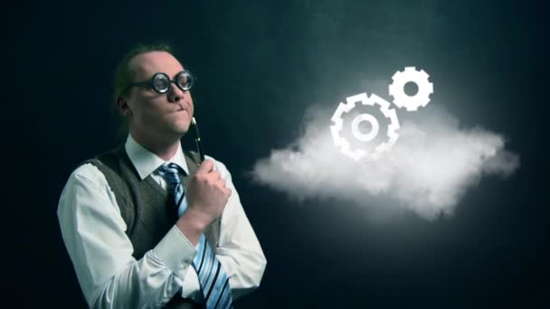 Legrační nerd nebo geek chtějí flying cloud s rotující ikona gears — Stock video