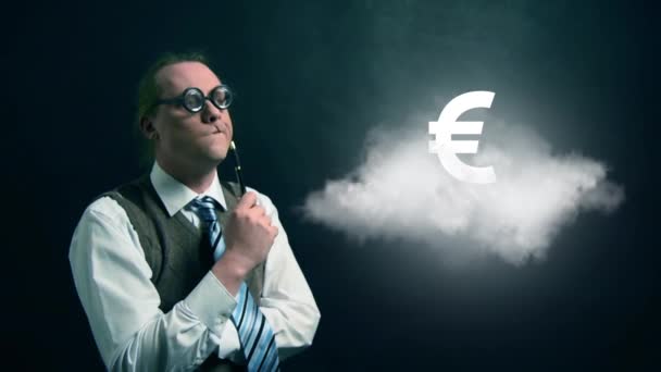 Funny nerd or geek looking to flying cloud with rotating euro icon — Stock Video