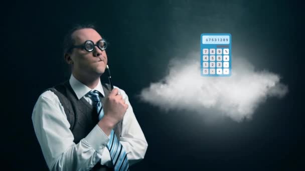 Funny nerd or geek looking to flying cloud with rotating calculator icon — Stock Video