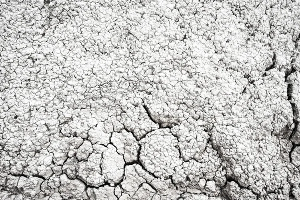 Secco e incrinato deserto terra texture sfondo — Foto Stock