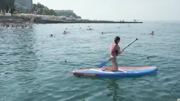 Sochi Russia July 2020 Female Surfer Sitting Surfboard Ocean Soaking — Stock Video