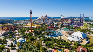 Sochi Park. Attractions. Landscape. infrastructure park. Russia. Amusement park and family holiday. alley of lights. Fountain. Roller coaster. Ferris wheel. hotel bogatyr clipart