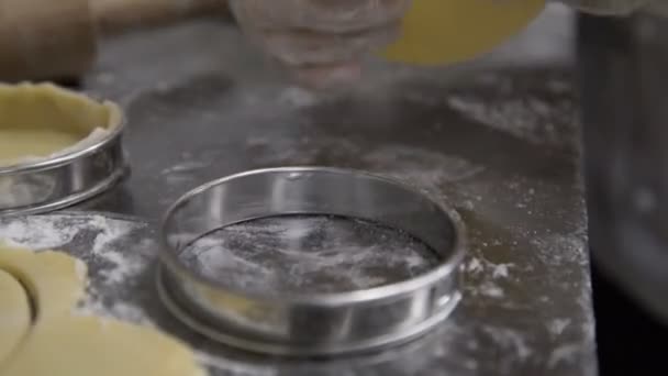 Closeup woman roll out dough for tartlet dough — Stock Footage Closeup woman roll out dough for tartlet dough Video Clip