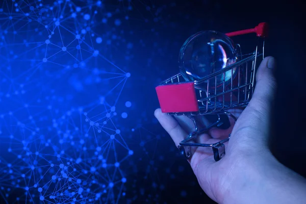 digital market shoping cart on hand in internet network web concept